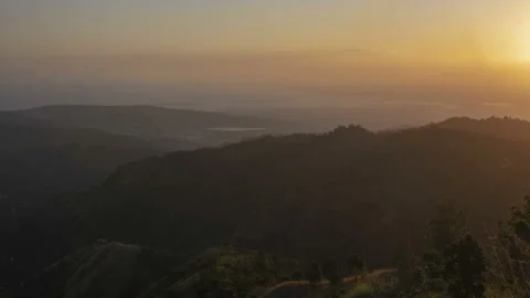 View over Blue Mountains towards Kingston, day to night time lapse, Jamaica Stock Footage 139013717
