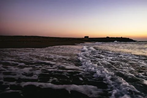 View over breaking surf at sunset Sidi Kaouki Stock Photos