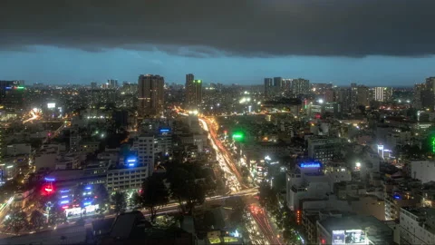 View over busy street in Ho Chi Minh, Vietnam, day to night timelapse Stock Footage 144817082