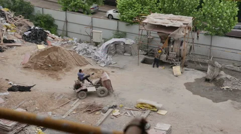 View Over A Chinese Construction Site and Concrete Mixer - 4K Stock Footage 51261195