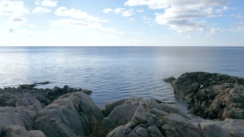 View over the cliffs at the ocean Stock Footage 86809905