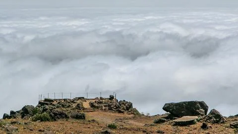 View over the clouds from slopes of Pico do Arieiro, Madeira timelapse Stock Photos
