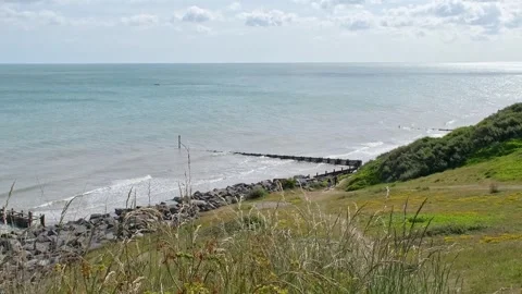 View over the coast from the cliff top path Video stock 310213247