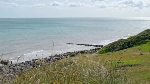 View over the coast from the cliff top path Video stock 310213596