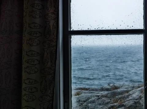 View over coast from window Stock Photos
