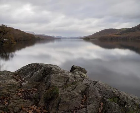 View over Coniston Water with clouds reflected in the water, Lake District Stock Photos