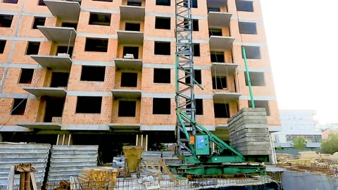 View over construction site, building and crane. Видео 157281443