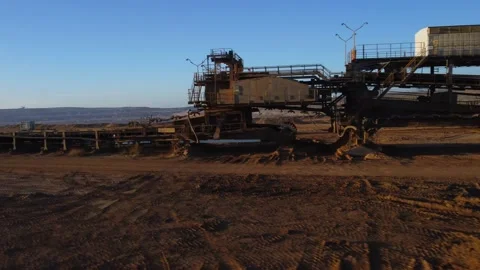View over conveyor belt machine in an open cast mine Stock Footage 220509993