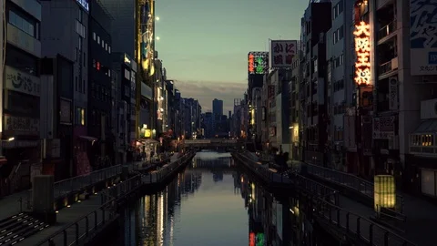 View over Dotonbori River in Osaka, Japan with reflections and neon lights at Stock-Footage 121486534