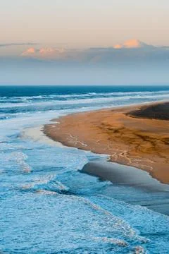 View over Dramatic Empty "Praia do Norte" Beach in Nazaré, Portugal Stock Photos