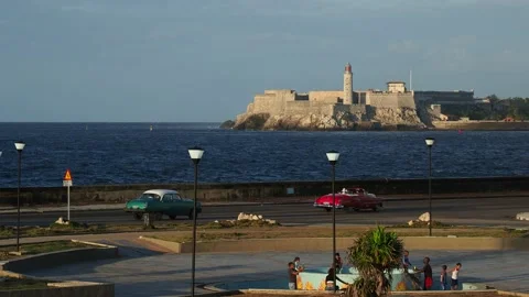 View over El Malecon towards El Morro Castle, Havana, Cuba Stock Footage 122301694