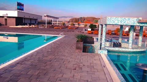 A view over external pool in Ozren Thermal Baths in Petrovo. Video stock 219025678