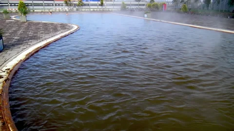 A view over external pool with thermal water in Ozren Thermal Baths in Petrovo. Vidéo 219421382