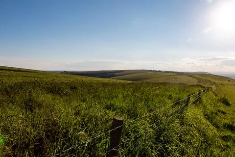 A view over fields at Ditchling Beacon in Sussex, on a sunny day Stock Photos