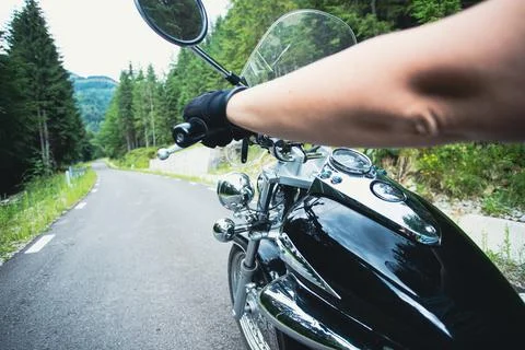 The view over the handlebars of motorcycle Stock Photos