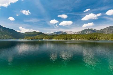 View over lake Eibsee in Garmisch-Partenkirchen, Germany in summer to a dista Stock Photos