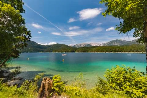 View over lake Eibsee in Garmisch-Partenkirchen, Germany in summer to a dista Stock Photos
