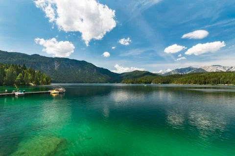 View over lake Eibsee in Garmisch-Partenkirchen, Germany in summer to a dista Stock Photos