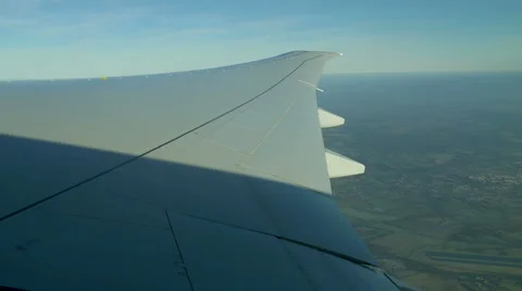 View over landscape &amp; aircraft wing in flight Video stock 48136115