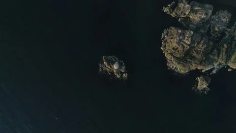 View over a lighthouse in the sea Stock Footage 132860263