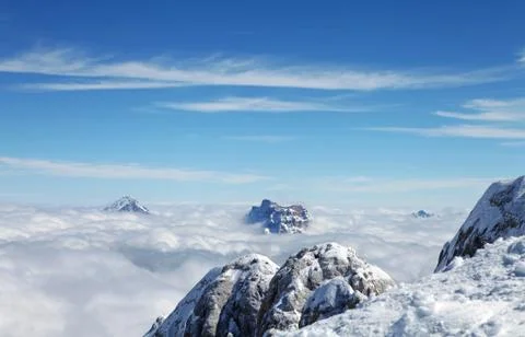 View over mountains above clouds Stock Photos