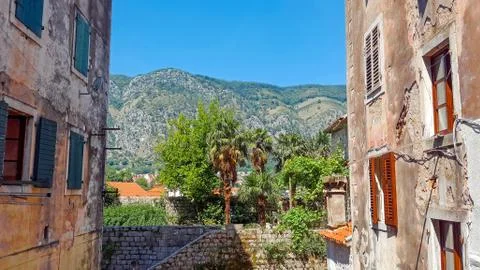 View over mountains between two building in Kotor, Montenegro Stock Photos