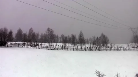 View over the mountains covered with snow during a cold winters Stock Footage 60401066
