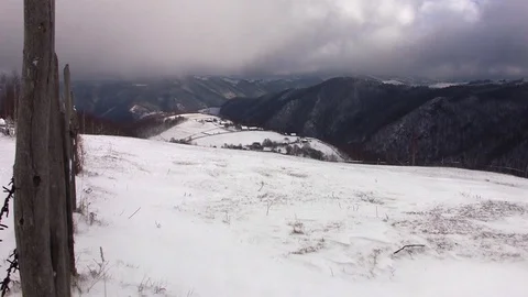 View over the mountains covered with snow during a cold winters Stock Footage 91904198