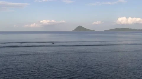 View over ocean and rainforest on tropical volcanic Siau Island Stock Footage 55422840