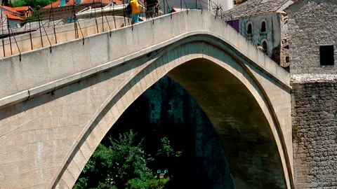 A view over Old Bridge during sunny summer day in Mostar. 動画素材 154313286