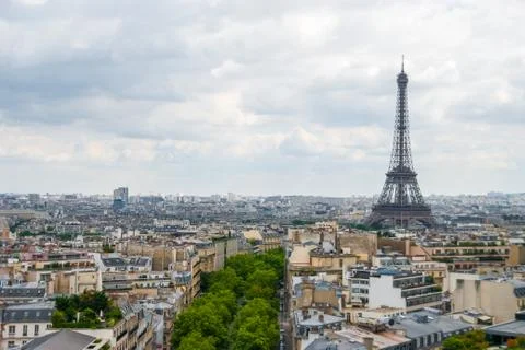 View over Paris Eiffel Tower cloudy sky city center Stock Photos