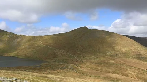 View over Red tarn, Swirral Edge and Helvellyn fell, Lake District Stock Footage 92115365