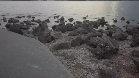 View over rocks in foreground and bay water looking south west from Turtle Crawl Stock Footage 262572434