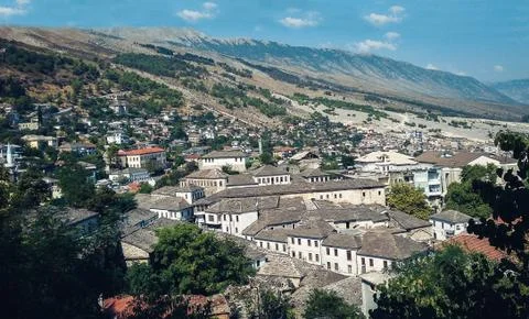 View over the rooftops of the city of Gjirokastra, Albania, beautiful citysca Stock Photos