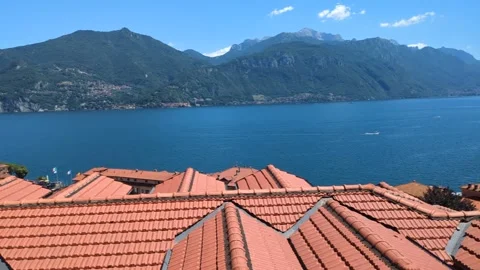 View over rooftops of Menaggio Lake Como Stock Footage 313361752