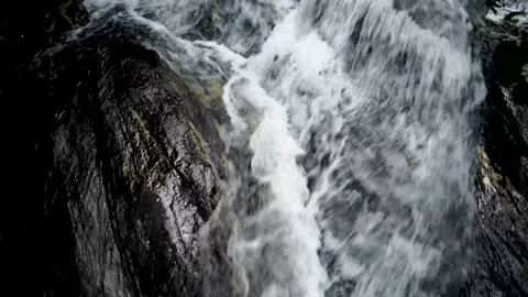 View over rushing waterfall Stock Footage 158326102