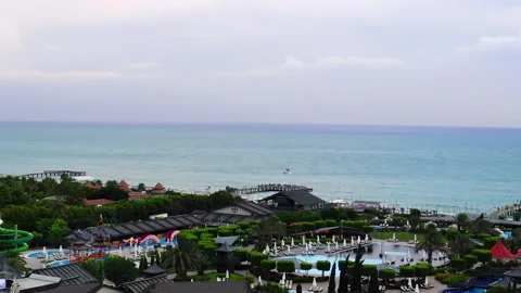 A view over sea with beach facilities during end of summer day. Stock Footage 144860783
