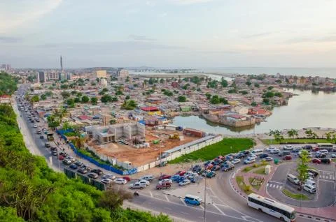 View over slums of Luanda with infamous traffic jams and Mausoleum of Agostinho Stock Photos