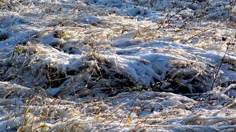 A view over snow covered and frozen landscape Видео 143767895