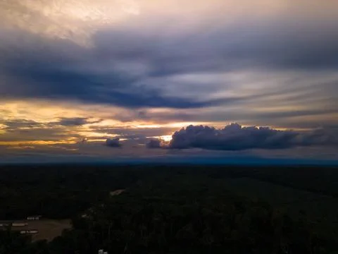 View over sunset over Amazon river with rainforest in Brazil. Stock Photos