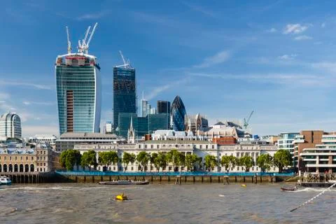 View over the thames river in london to the city with several new skyscrapers Stock Photos