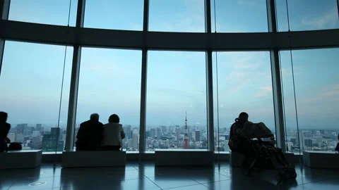 View over Tokyo Observation Deck Mori Tower 4K Camera move towards the window Stock Footage 221378202