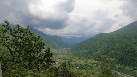 View over Valsassina with cloudy sky, from Crevesto cross Video stock 241448197