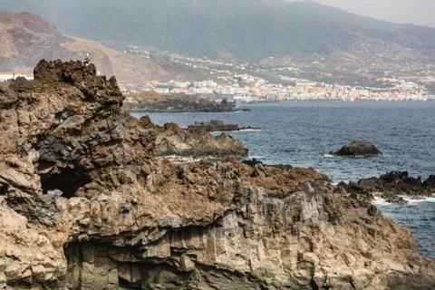 View over volcanic cliffs at the coastline of Los Cancajos in La Palma, Spain Stock Photos