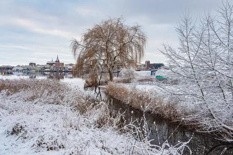 View over the Warnow in winter time to the Hanseatic city of Rostock, Germany Stock Photos