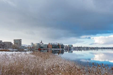 View over the Warnow in winter time to the Hanseatic city of Rostock, Germany Stock Photos