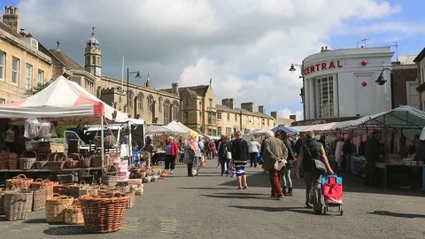 View over the weekly Friday Market, Stamford town, Lincolnshire Stock Footage 107042207