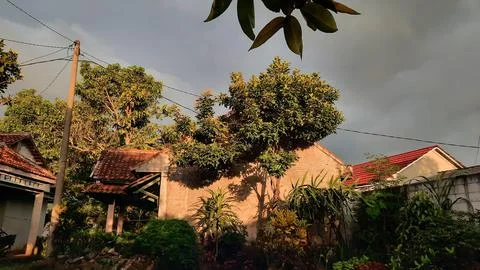 View of overcast clouds with sunset light Stock Photos