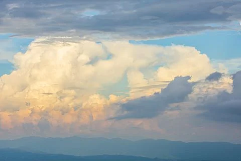 View of an overcast sky. Dramatic gray sky and white clouds before rain Stock Photos