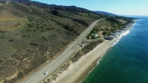 View on the Pacific coast and a road Stock Footage 78221105
